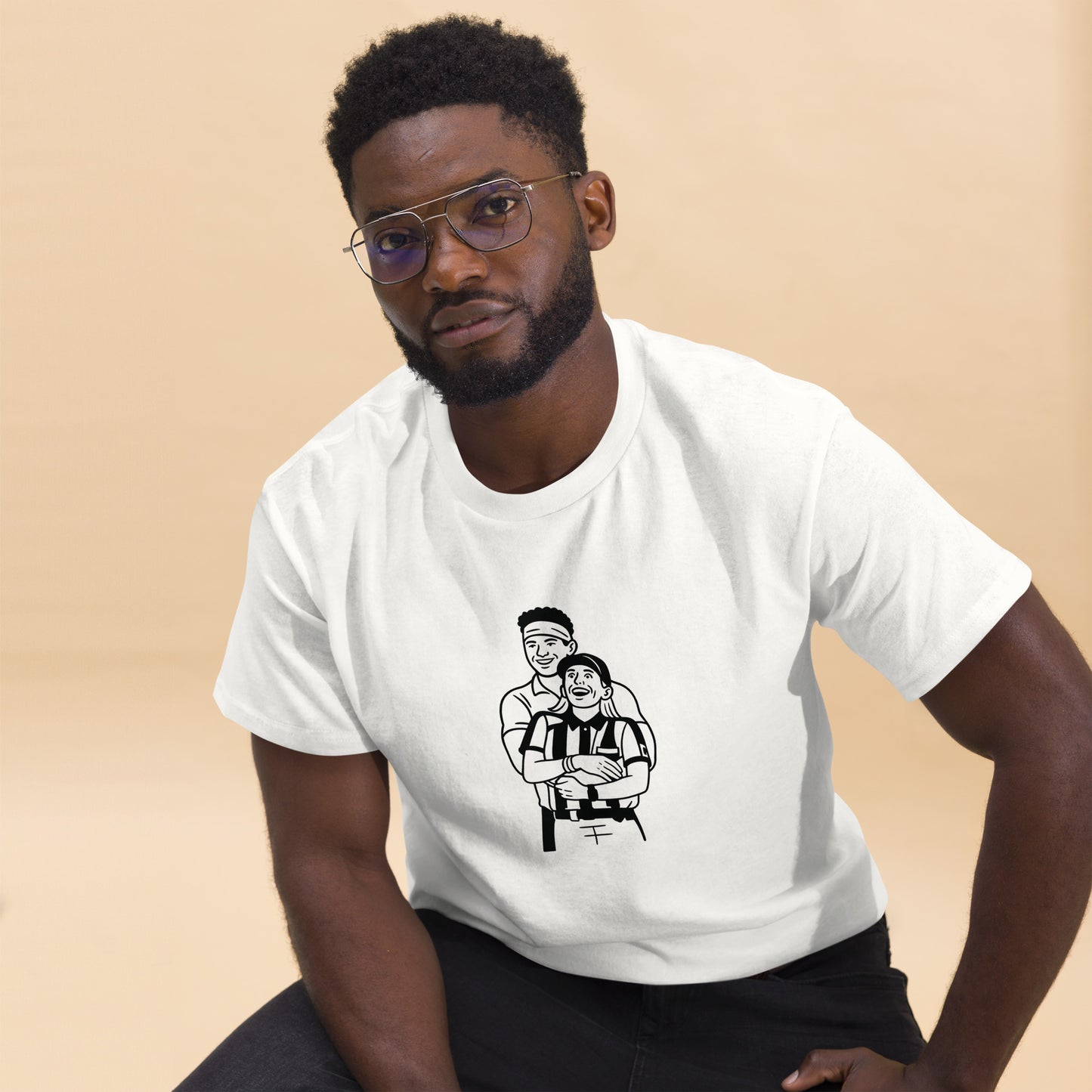 Man wearing a white t-shirt with a graphic design on a beige background