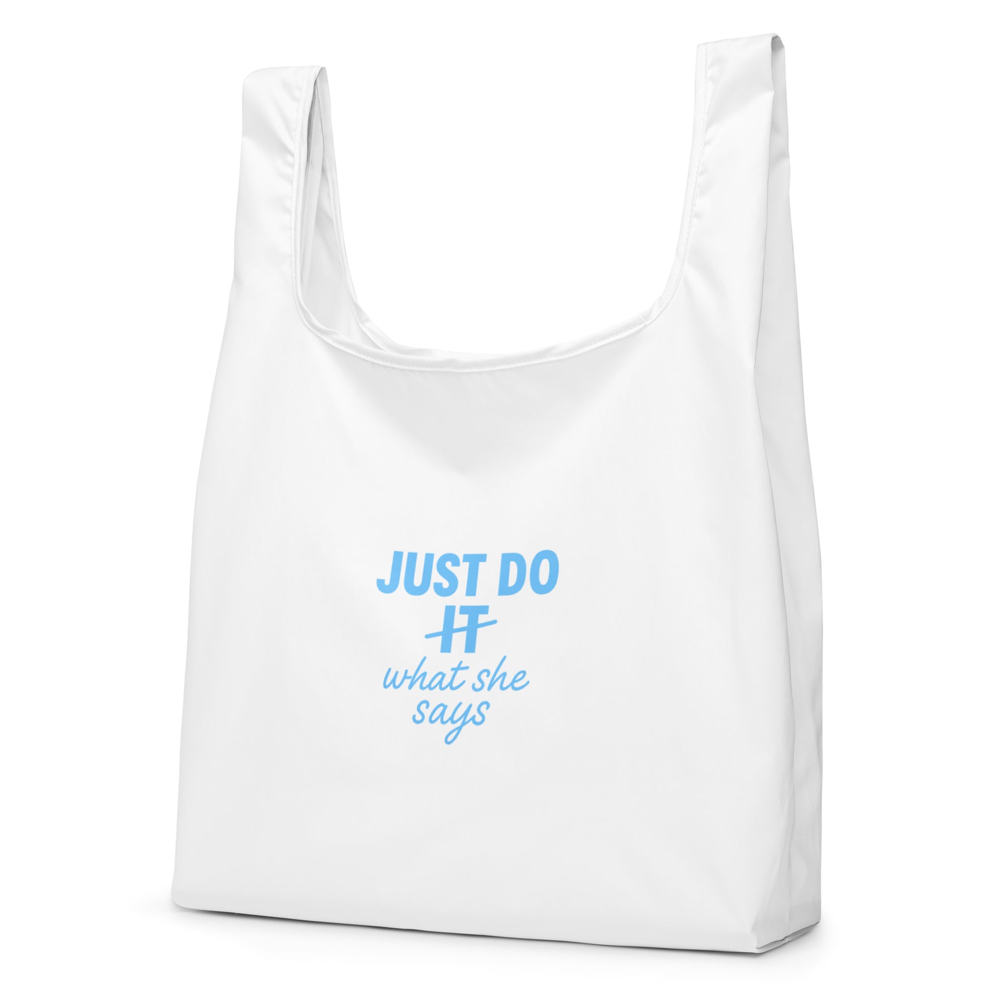 Image of a white tote bag with the Just Do what she says slogan on it.