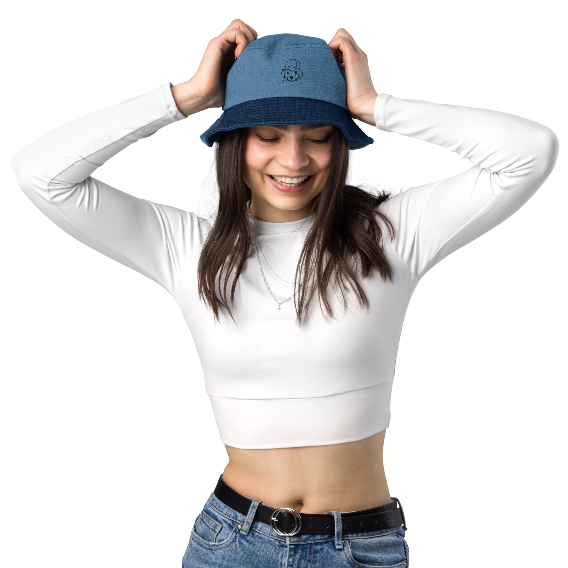 Woman wearing a blue cap and white long-sleeve shirt on a white background