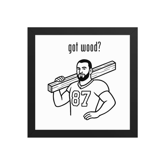 Framed artwork with a man carrying wood and 'got wood?' text.