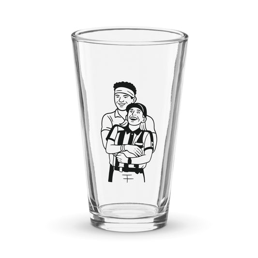 Clear glass with a black and white illustration of two people on a white background