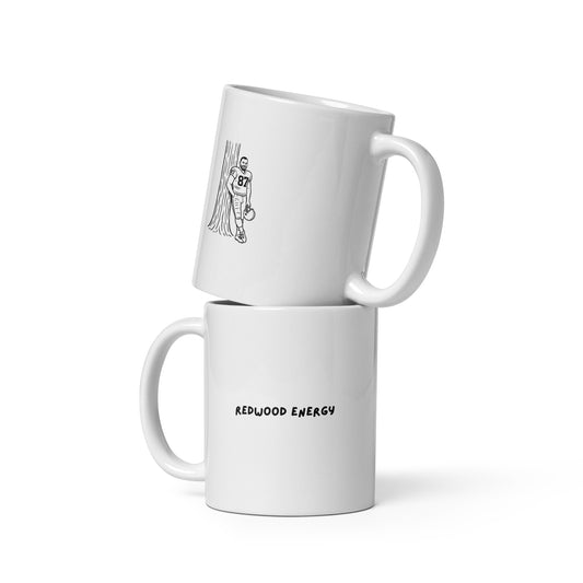 Two white mugs with a graphic design and text on a white background