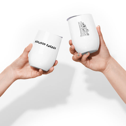 Two white tumblers held by hands with text on a white background
